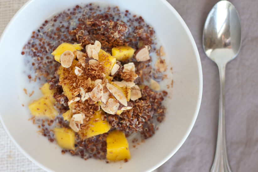 breakfast quinoa with fresh mango, apple sauce, coconut and almonds breakfast quinoa with fresh mango, apple sauce, coconut and almonds