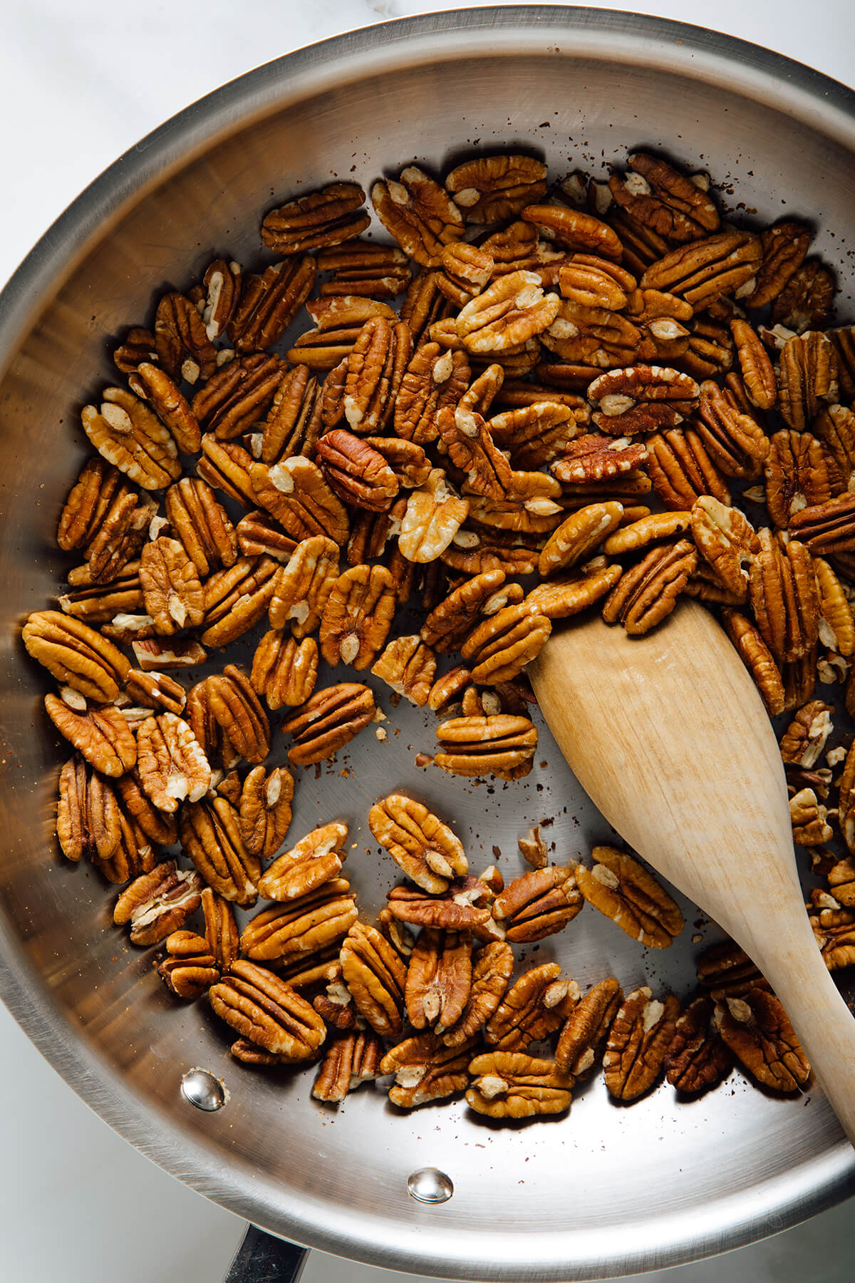 toasted pecans in skillet