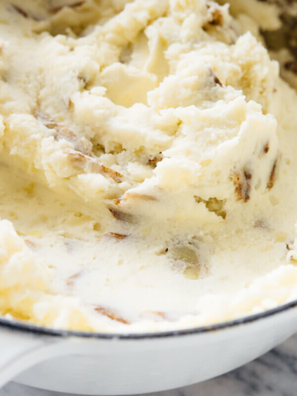 My family's favorite mashed potatoes—they're ultra creamy, a little tangy, and you can make them ahead! #Thanksgiving