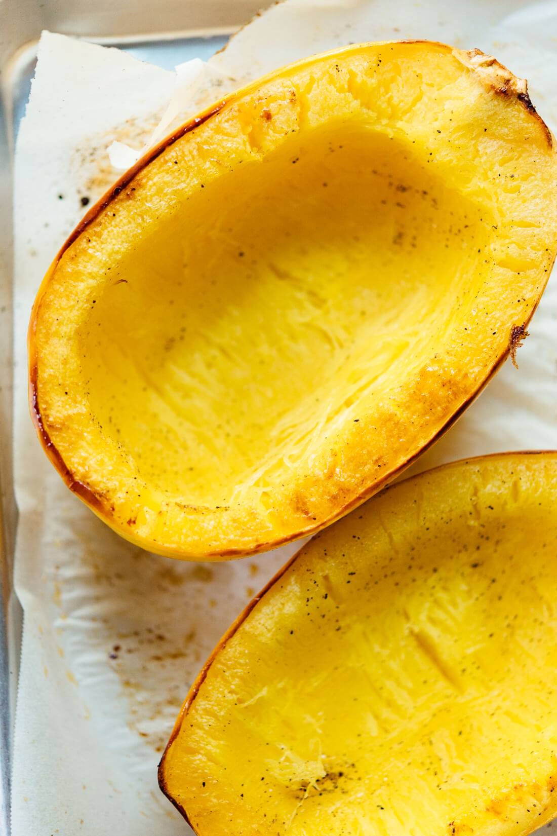 best way to cook spaghetti squash - halved, seeds scooped out, baked cut side down, with olive oil and salt!